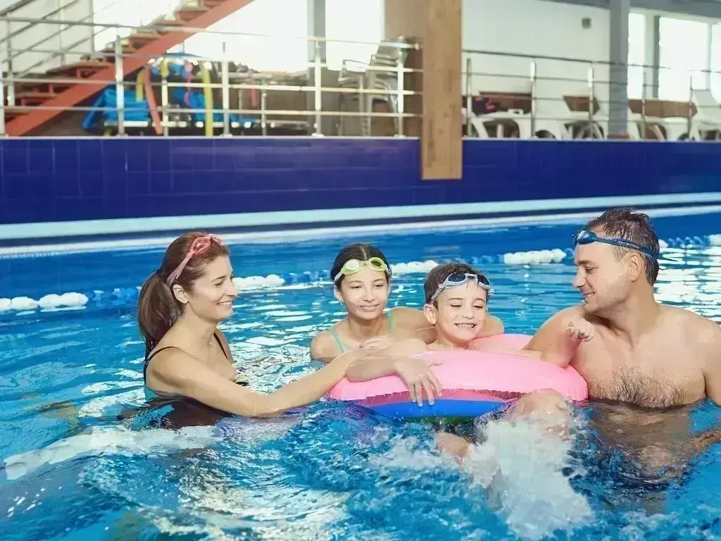 Residential in-ground pool closing in Summerland BC with skimmer protection and winter chemical treatment