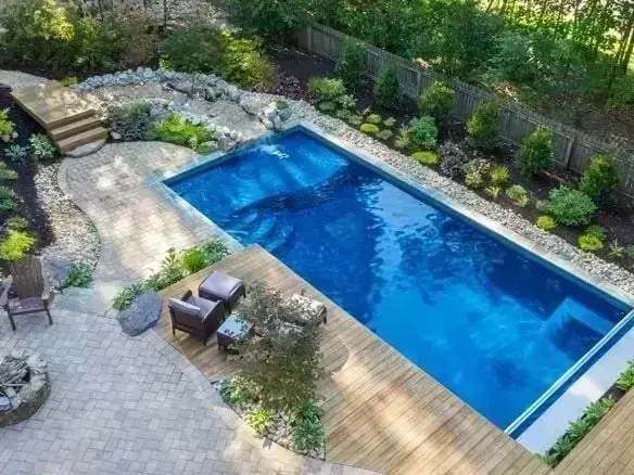 Semi in-ground pool build on a sloped West Bench property in Penticton British Columbia